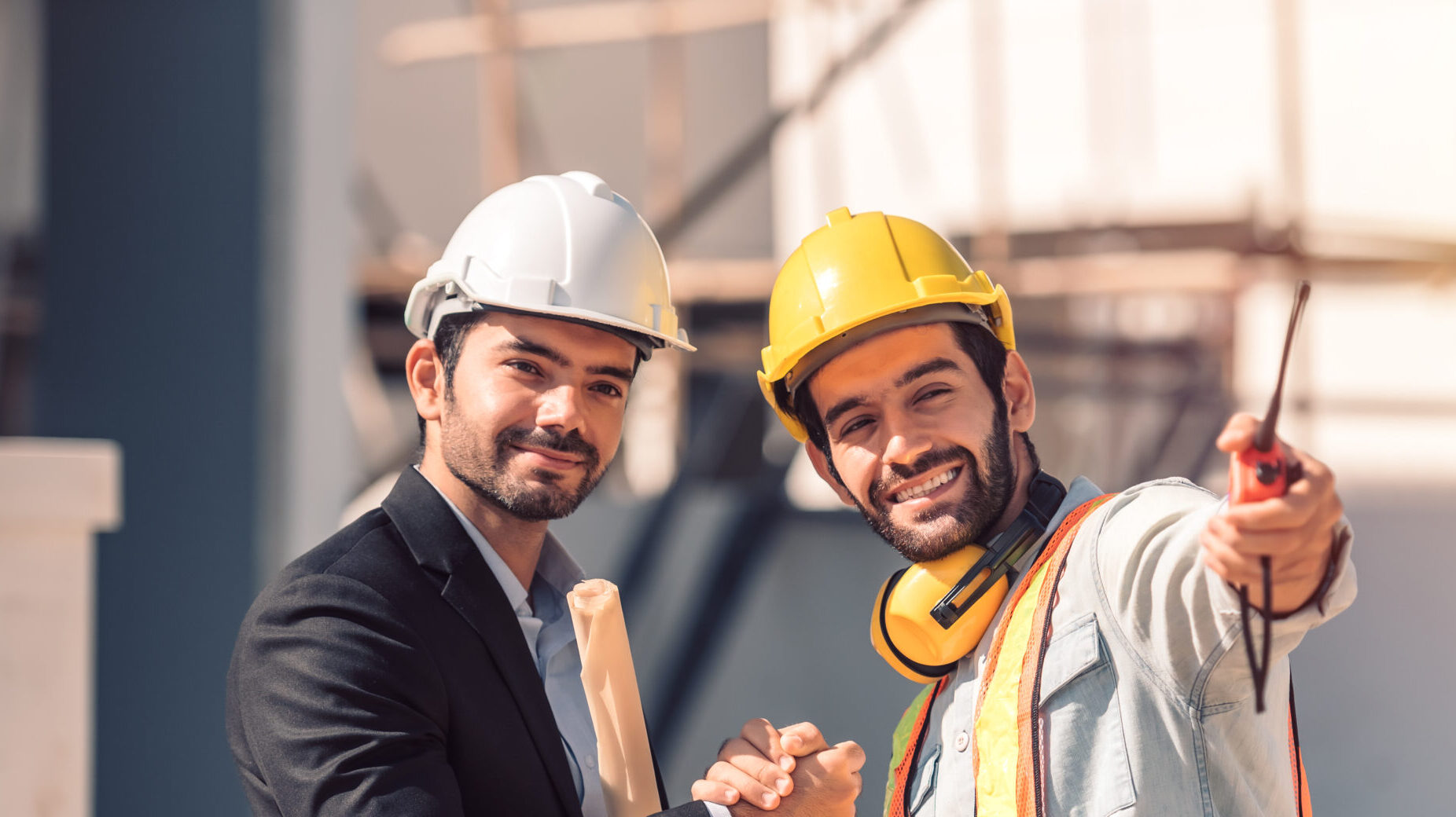 Smart Staffing Success: Skilled Worker and Manager at Canadian Construction Site